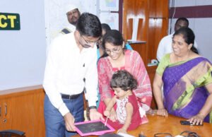 చిన్నారికి కలెక్టర్చే అక్షరాభ్యాసం